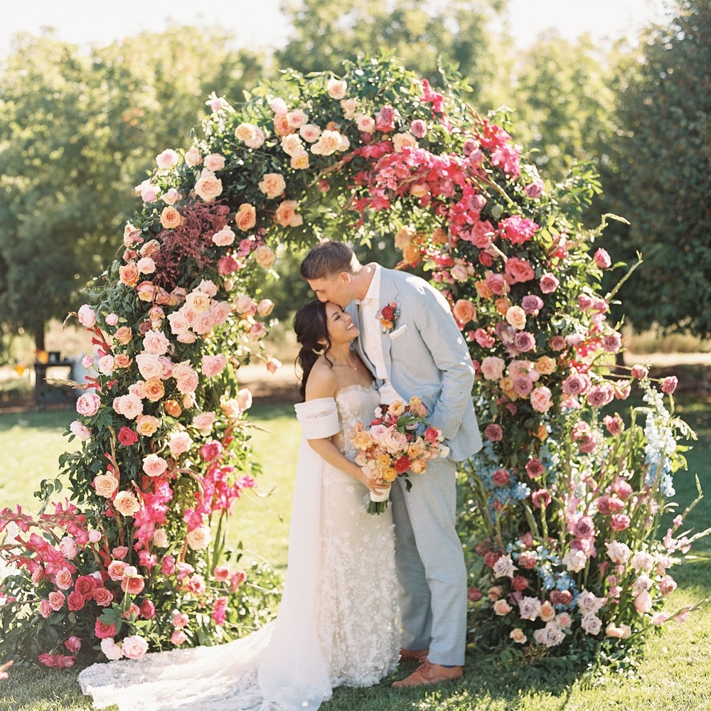 couple enjoy wedding flower