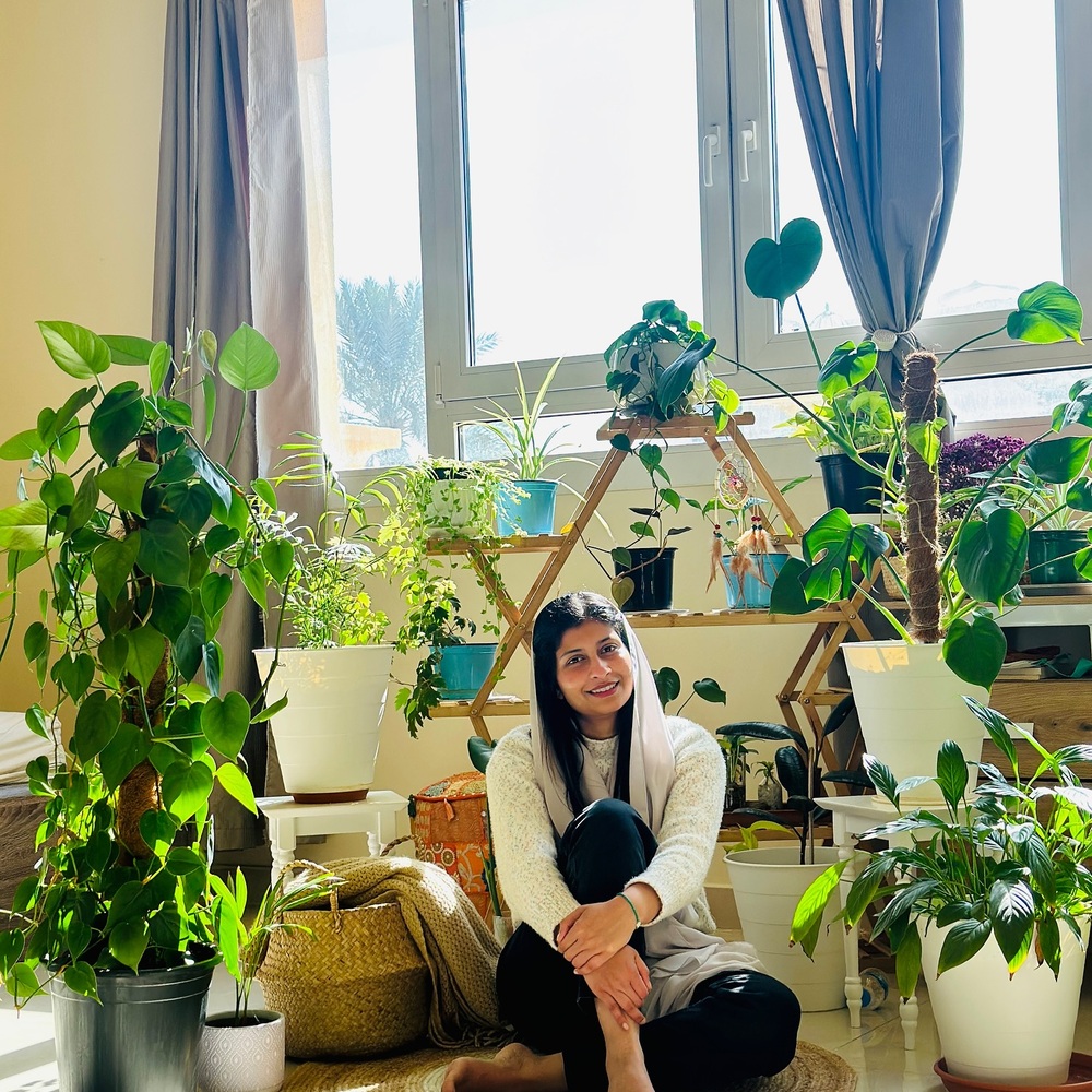 lady with there indoor plants