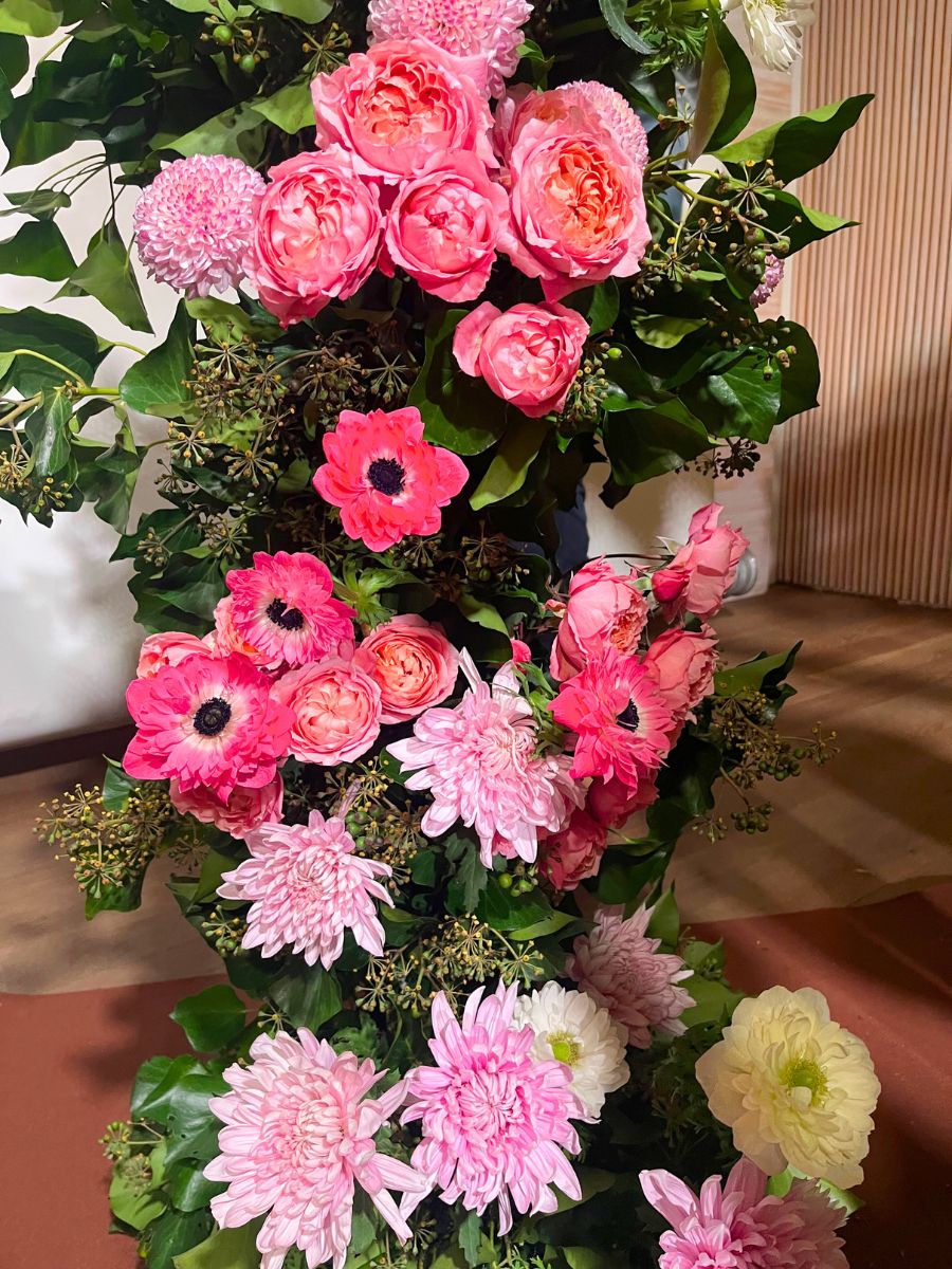 Pink anemones chrysanthemums and garden roses