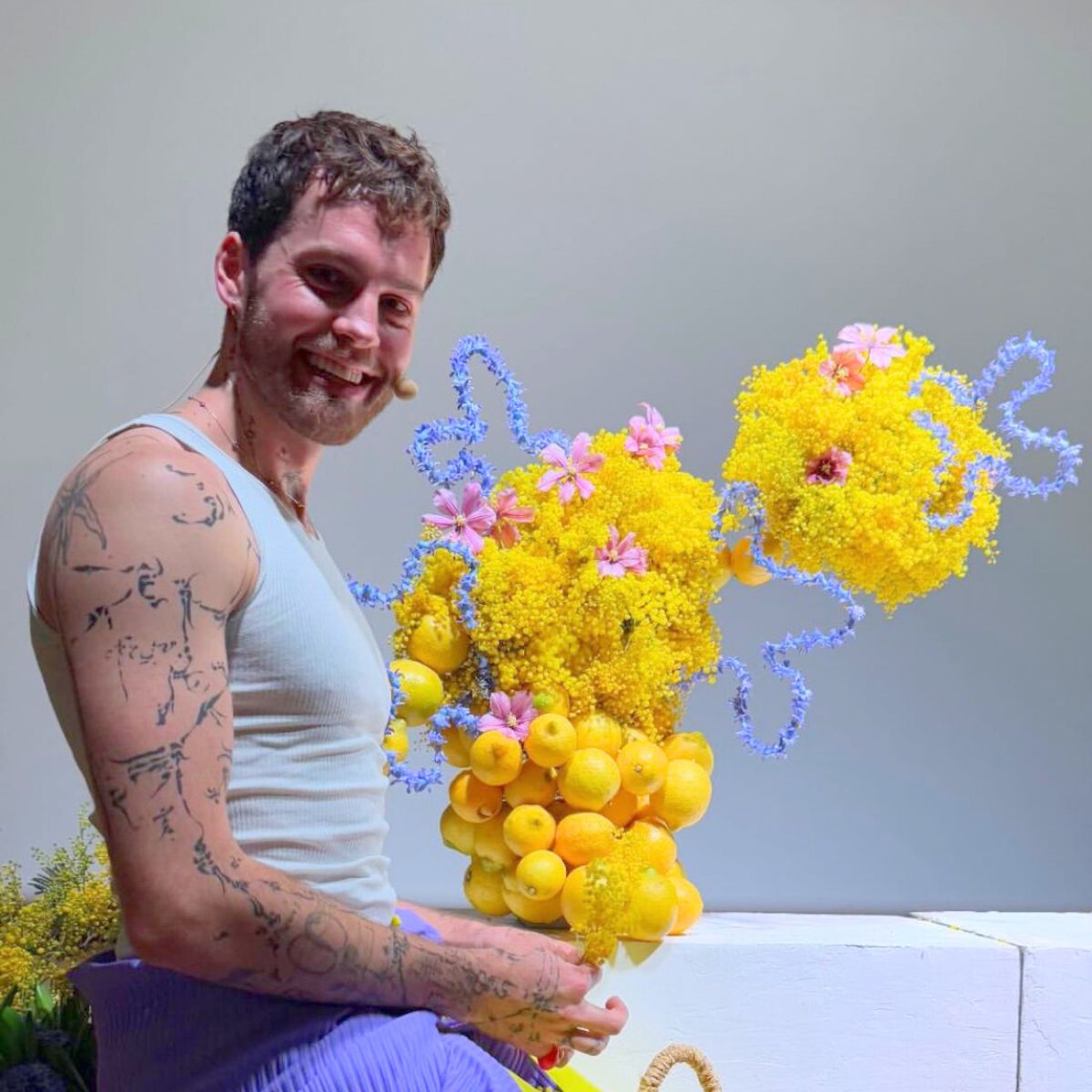 Hamish Powell with colorful arrangement