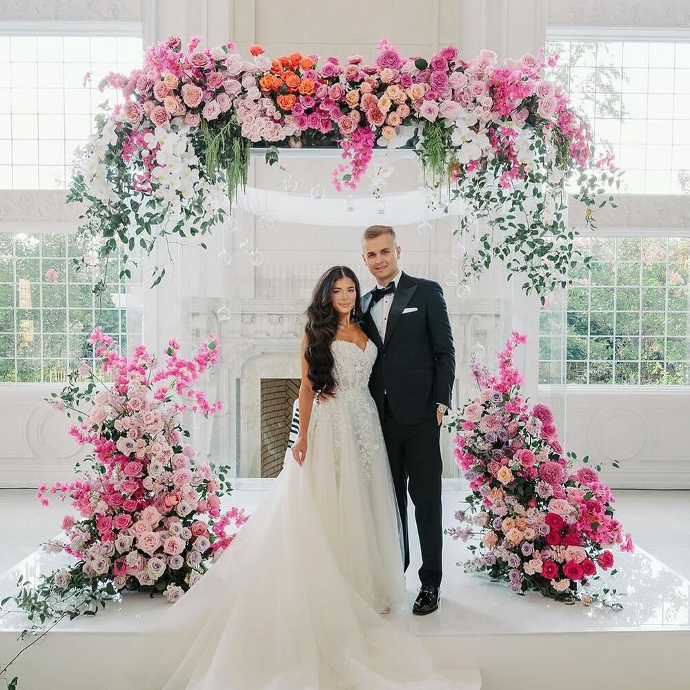 Couple wedding with pink flowers