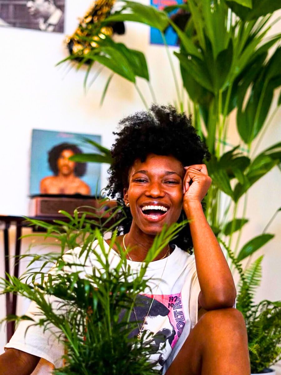 Girl with Parlor Palm bouseplant