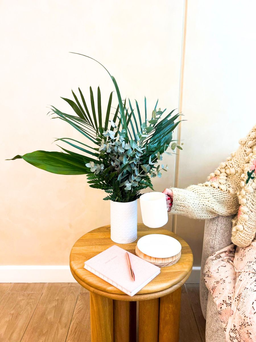 Green arrangement on table