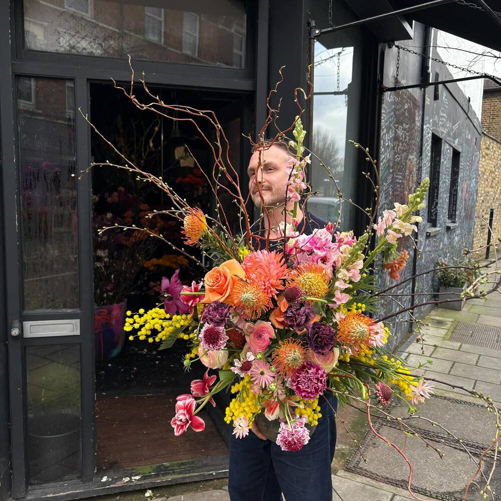 Men with multi color flower