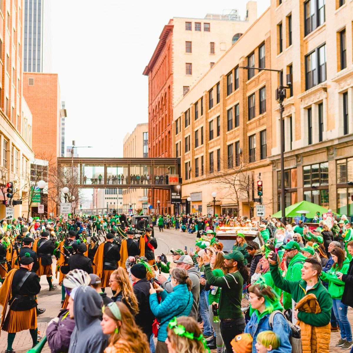 People in the street celebrating St Patricks