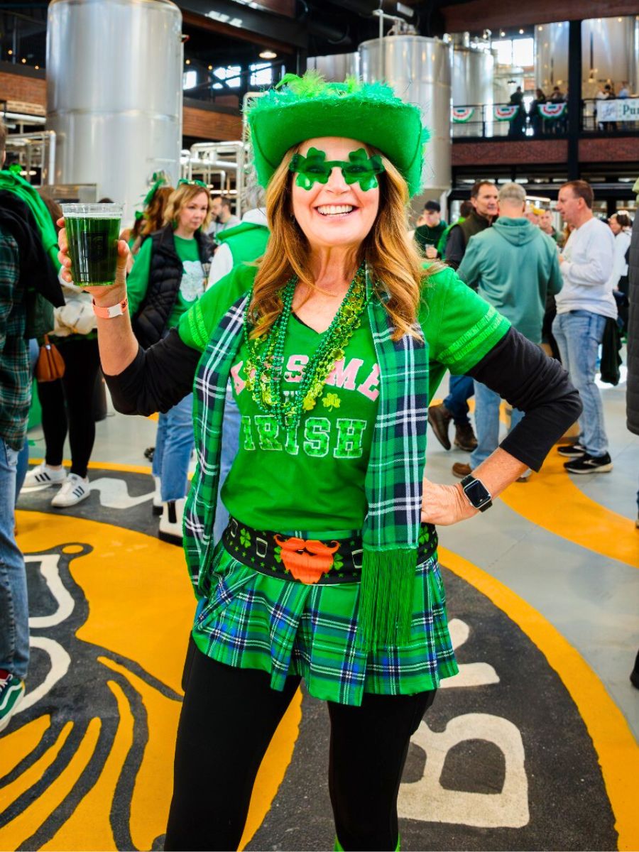 Woman dressed up in green for Saint Patricks