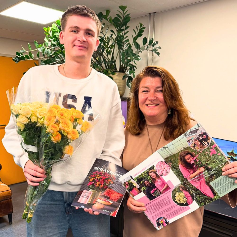 Warja Abrosimova displays her feature in the magazine World of Spray Roses