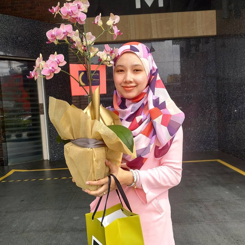lady with light pink flower bouquet lady with light pink flower bouquet