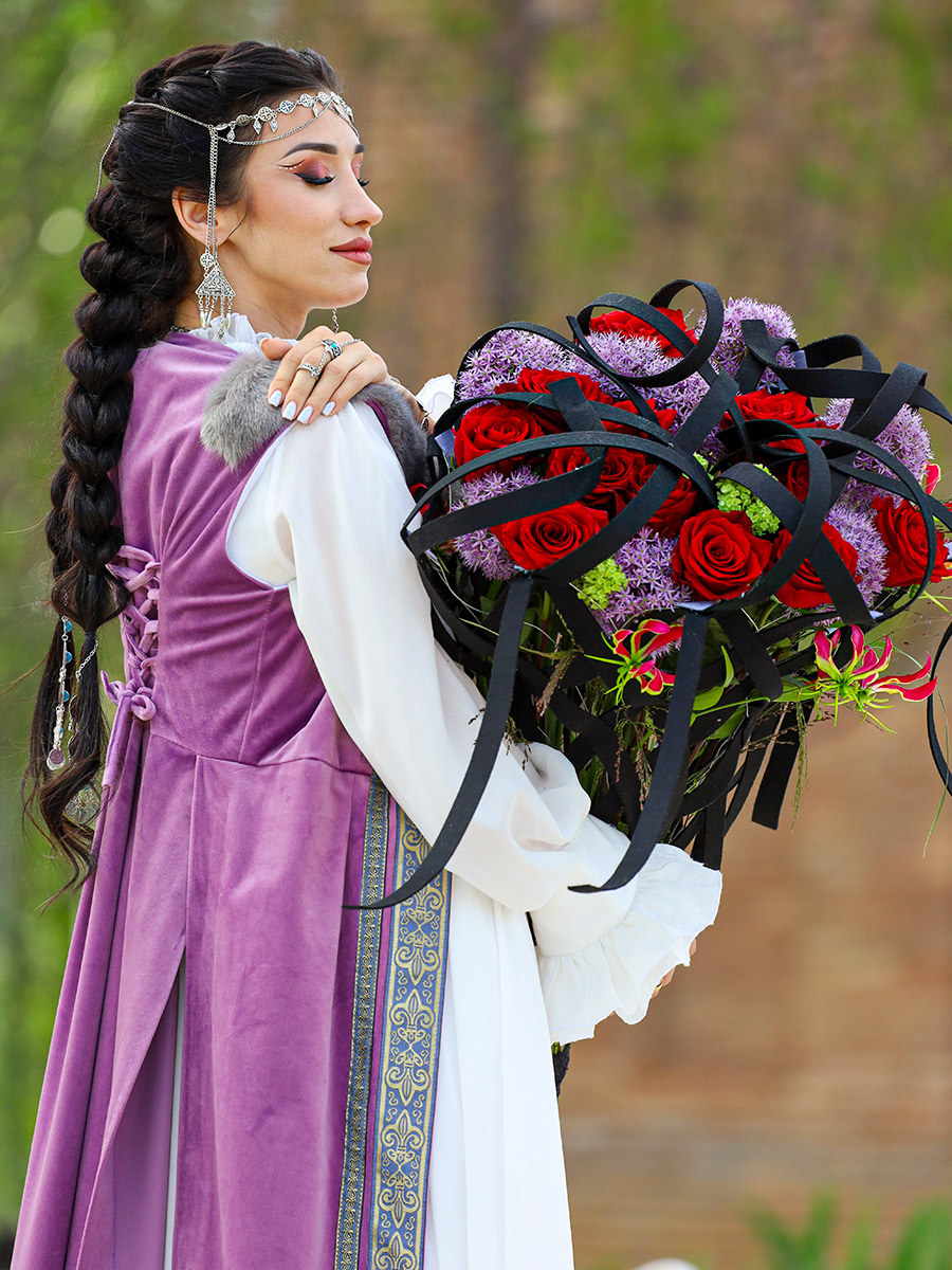 Kazakh lady with red rose and Allium bouquet