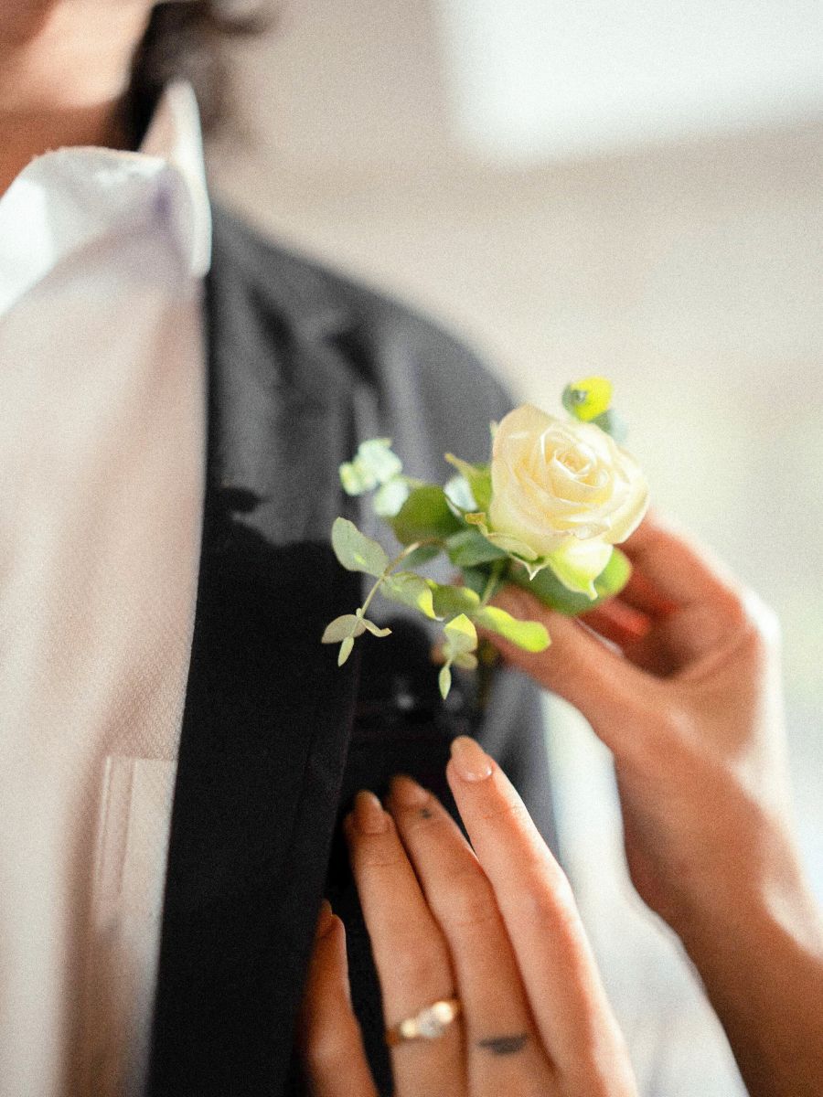 Boutonniere with a white rose by Sunrite Boutonniere with a white rose by Sunrite