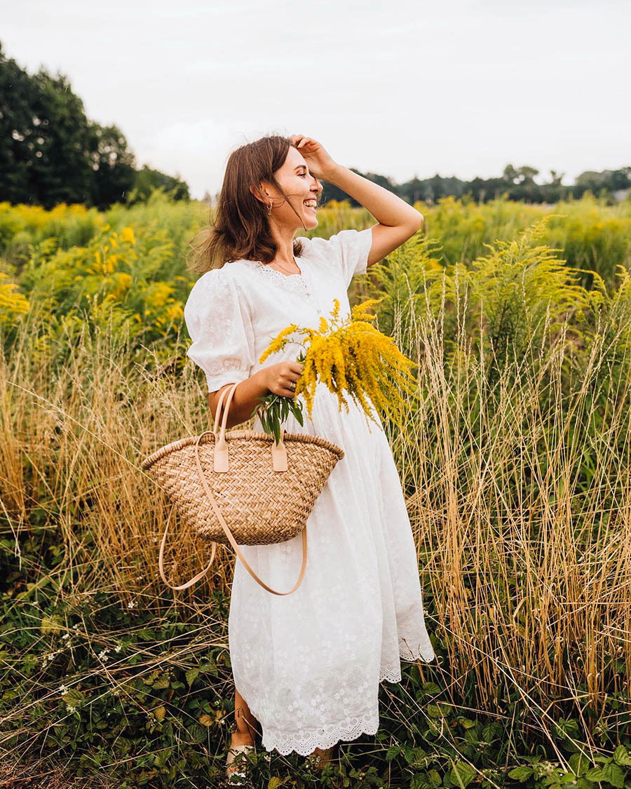 Woman in field with Solidago by mycodeofstyle