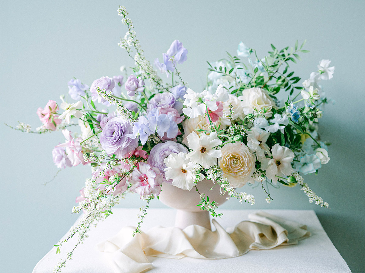 Katya Hutter Ikebana bowl with roses and Ranunculi