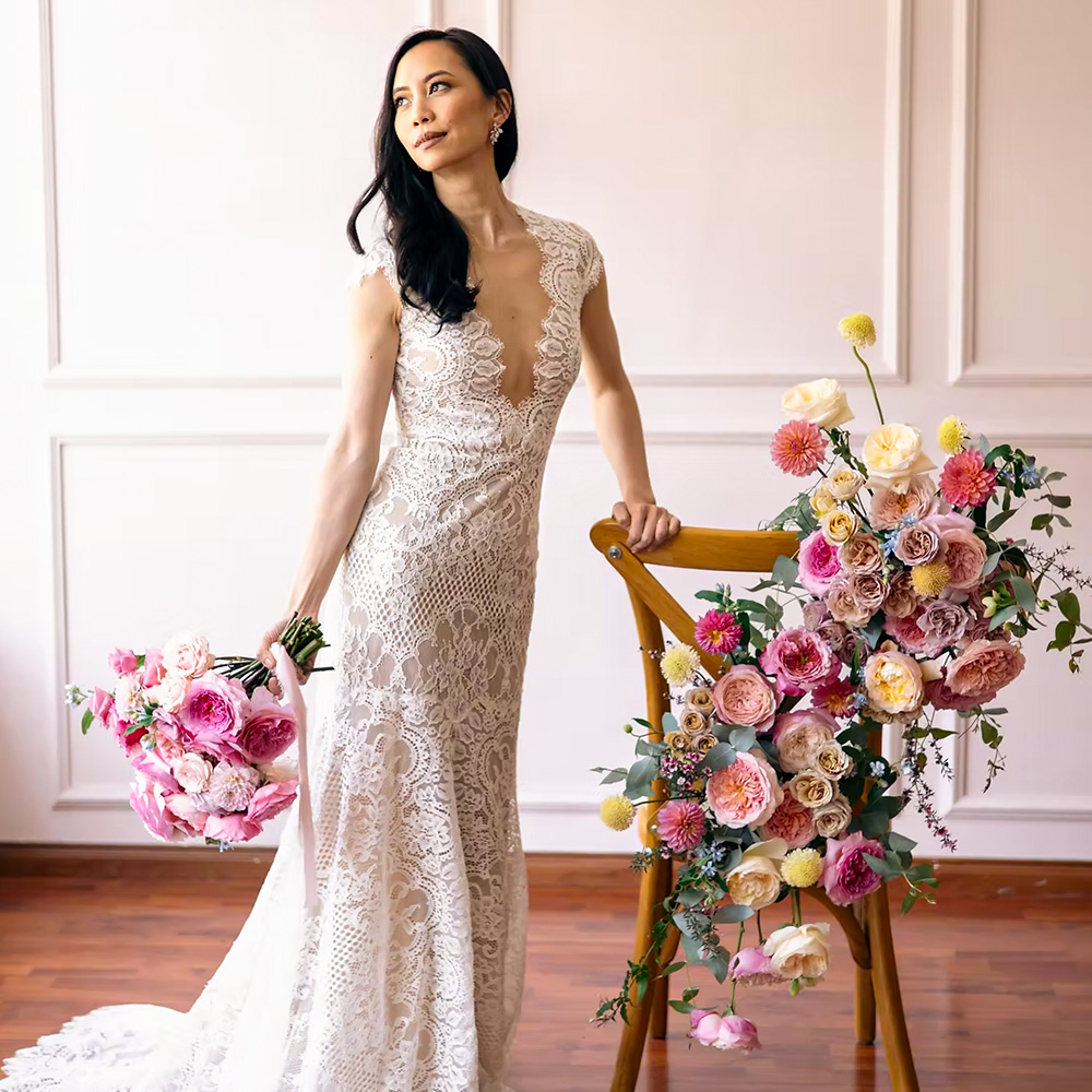 Alexandra Farms Brides model with cheerful abundant roses Alexandra Farms Brides model with cheerful abundant roses