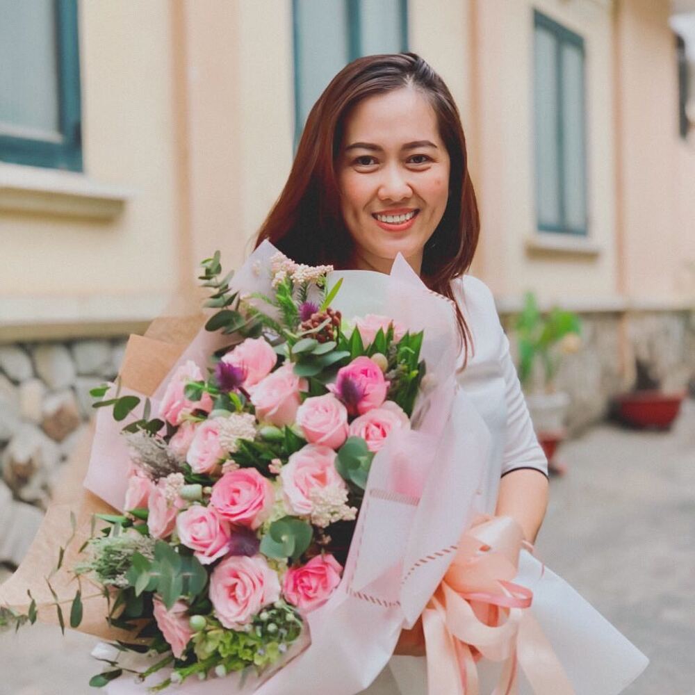 lady florist holding rose bouquet lady florist holding rose bouquet
