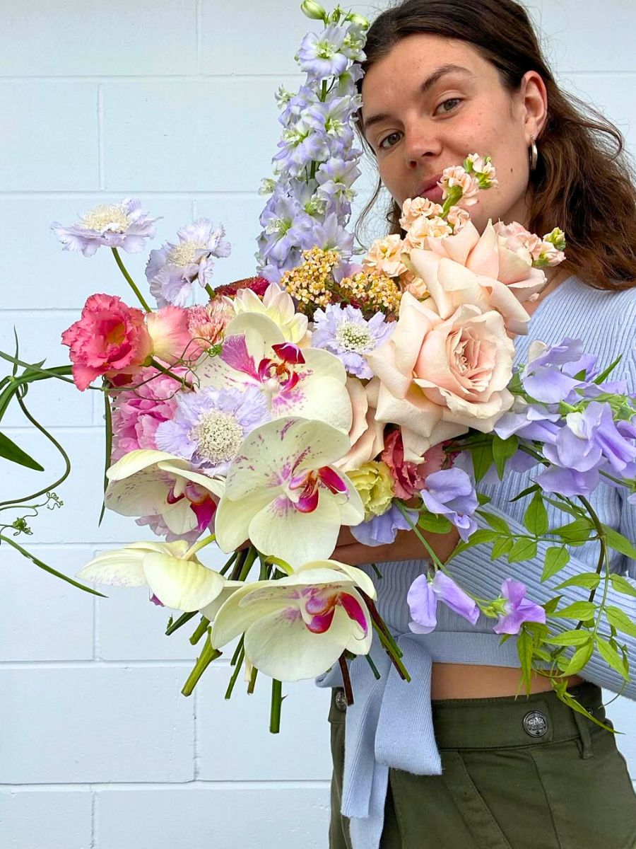 Flavia in between flowers