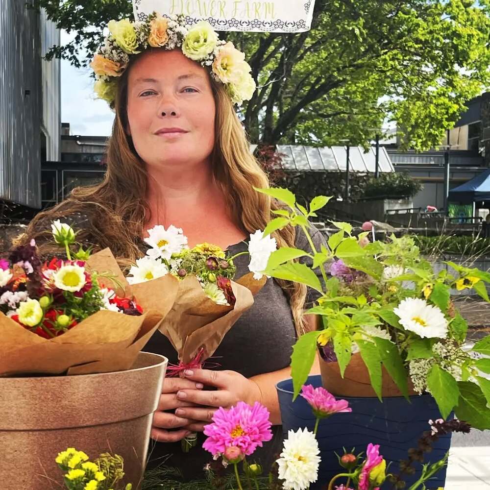 Old lady dressed up with flowers Old lady dressed up with flowers