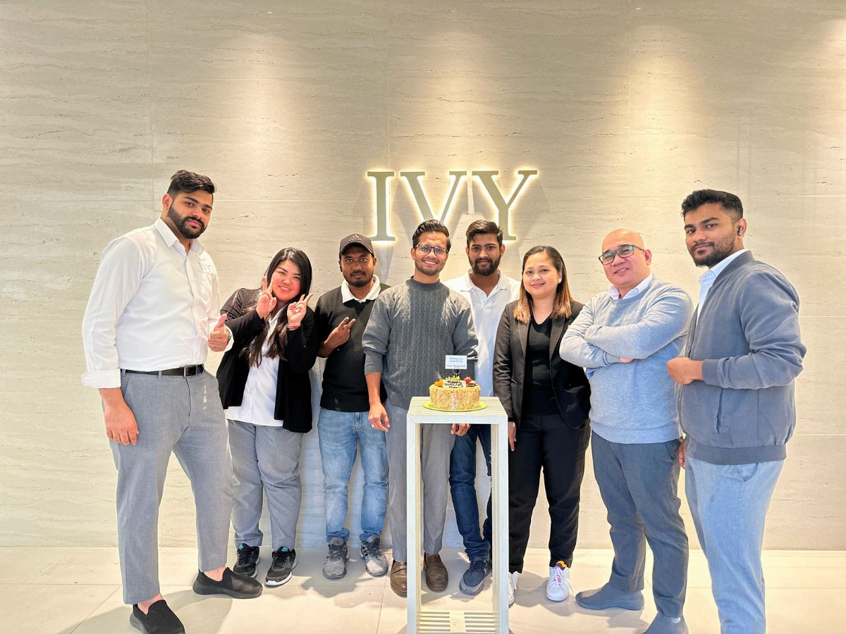 Kazi Sagar poses for a picture with his colleagues at IVY Bahrain 10 Questions to