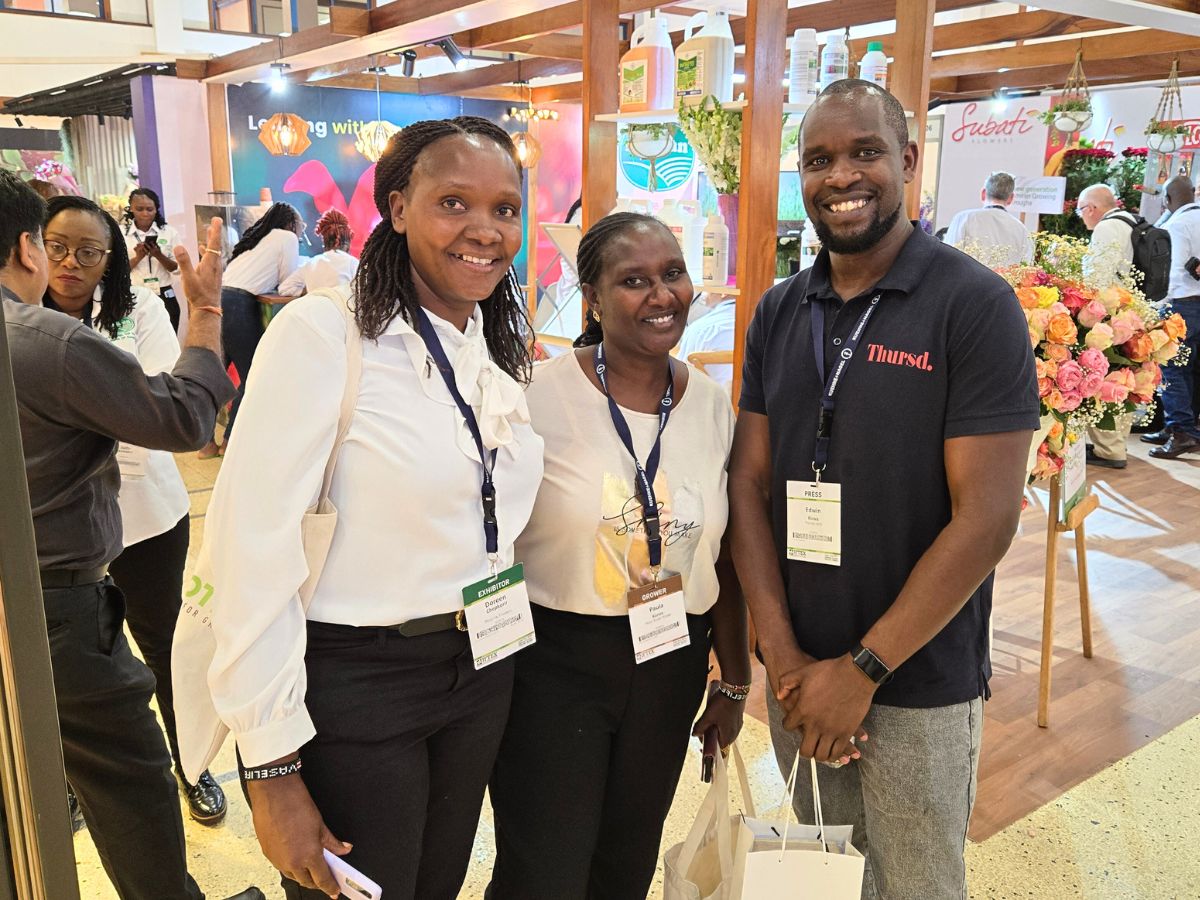 Edwin Kirwa customer success manager on Thursd poses for a picture with the team from Mzurrie Roses at the IFTEX 2025 Thursd at the IFTEX 2025