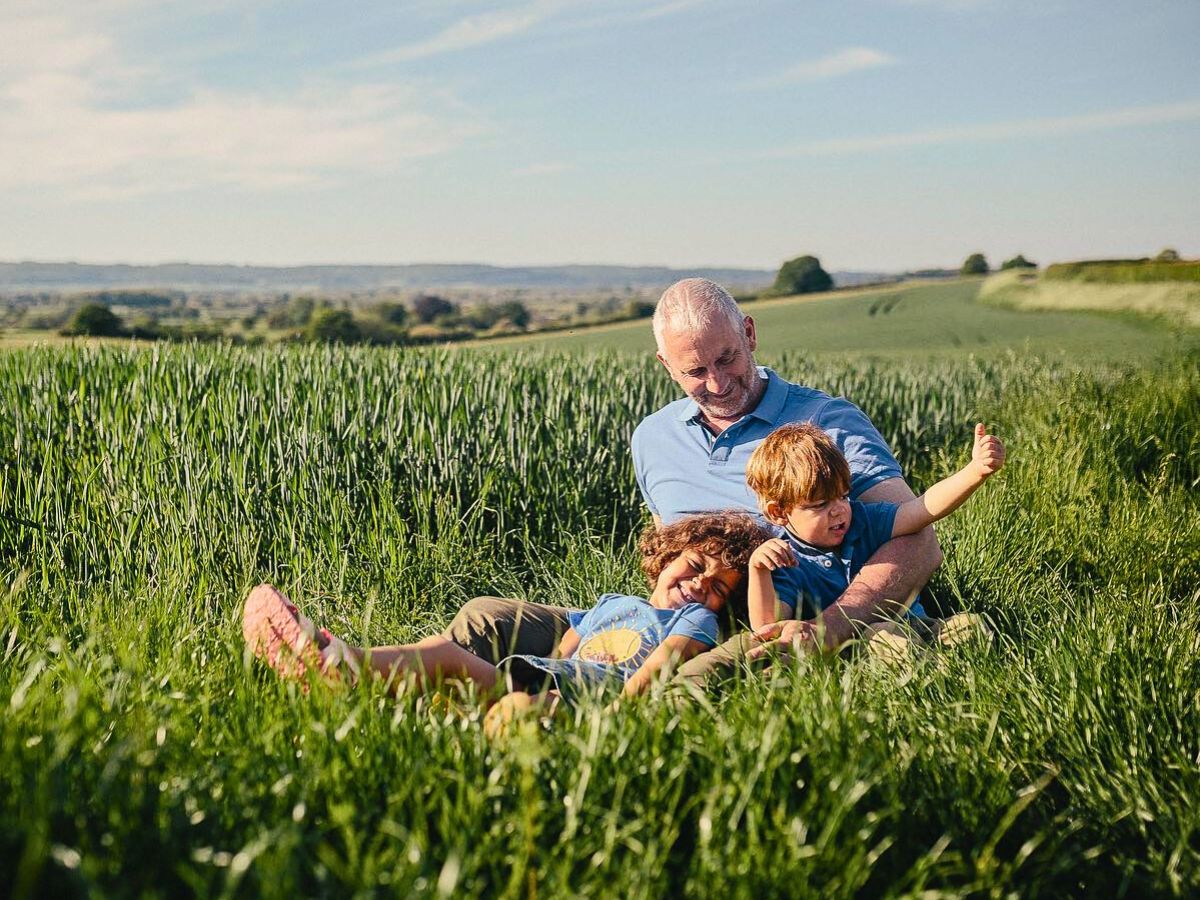 Father and his kids What Are the Best Flowers to Gift This Father’s Day?