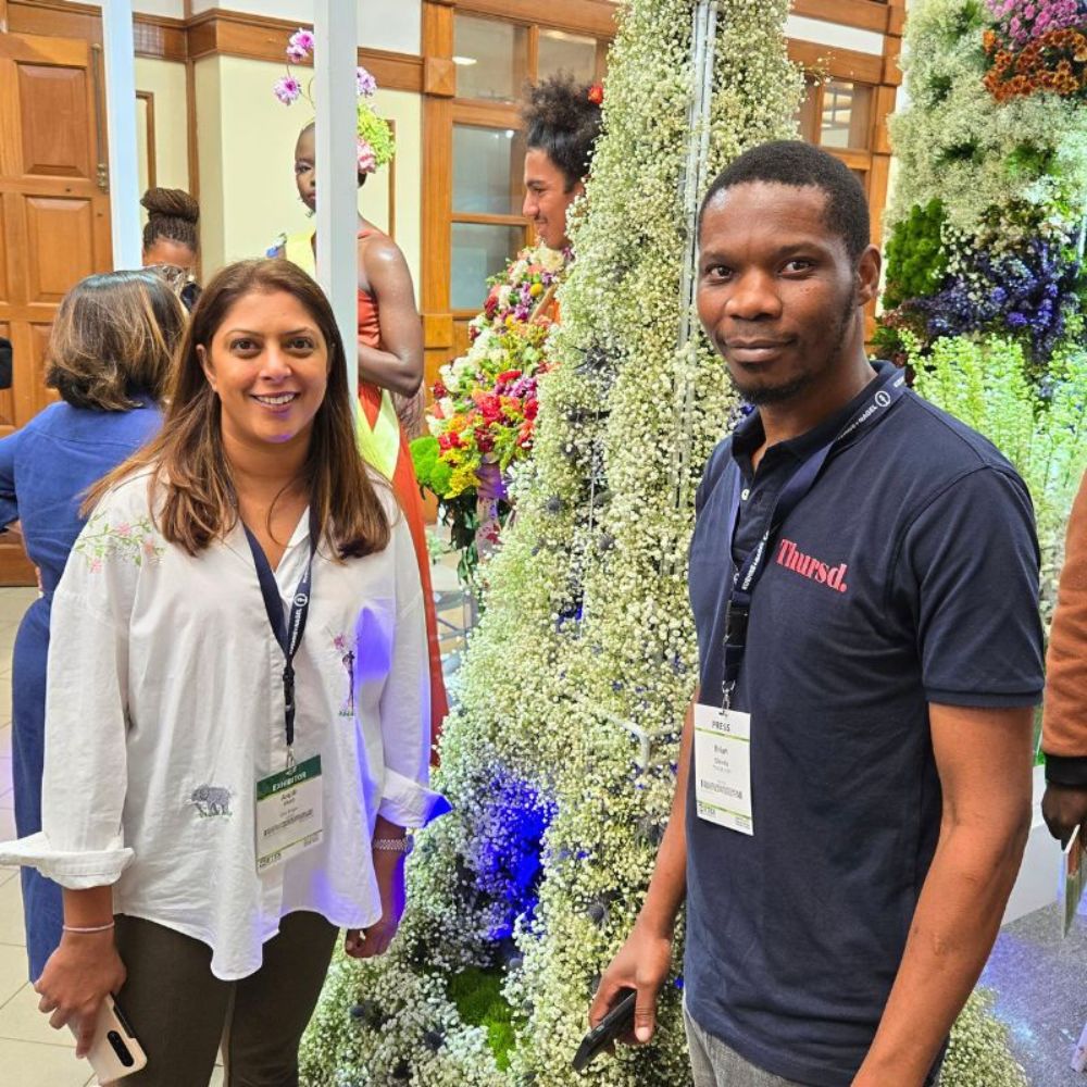 Brian Okinda content editor on Thursd poses for a picture with Anjili Shah of Ole Ngai Growers Thursd at the IFTEX 2025