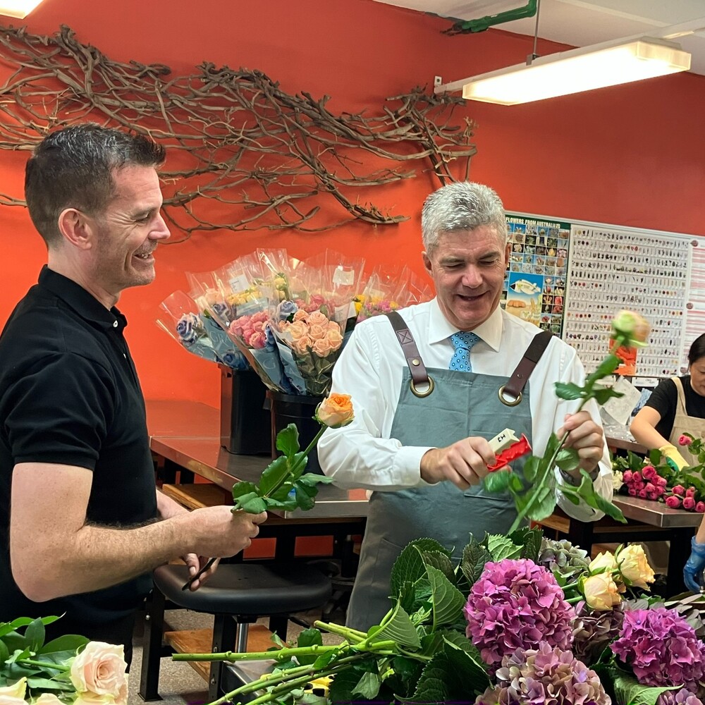 Old men sharing florist experience with other people Old men sharing florist experience with other people