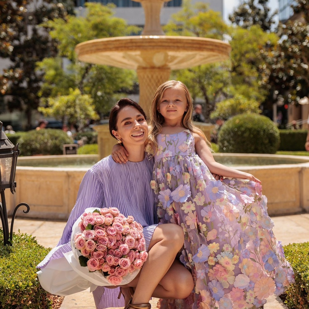 Lady with child attending wedding Lady with child attending wedding