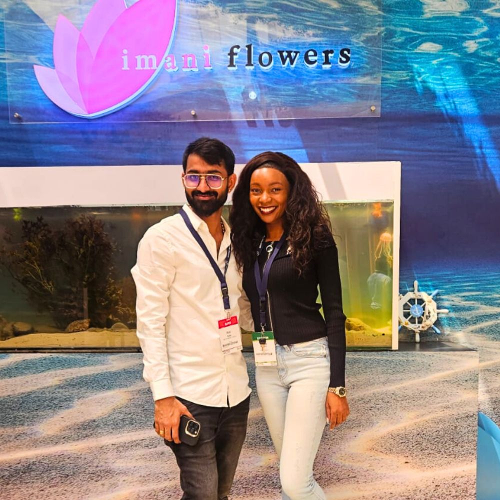 Wendy Makena of Imani Flowers poses for a picture with a client Imani Flowers