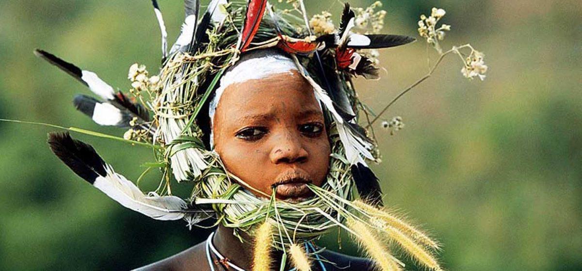 Ethiopian tribe boy whith feathers article on Thursd