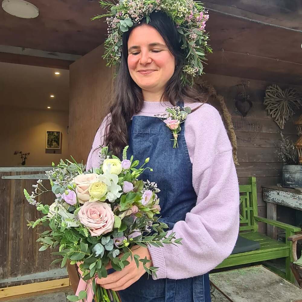 Student with flower bouquet Student with flower bouquet