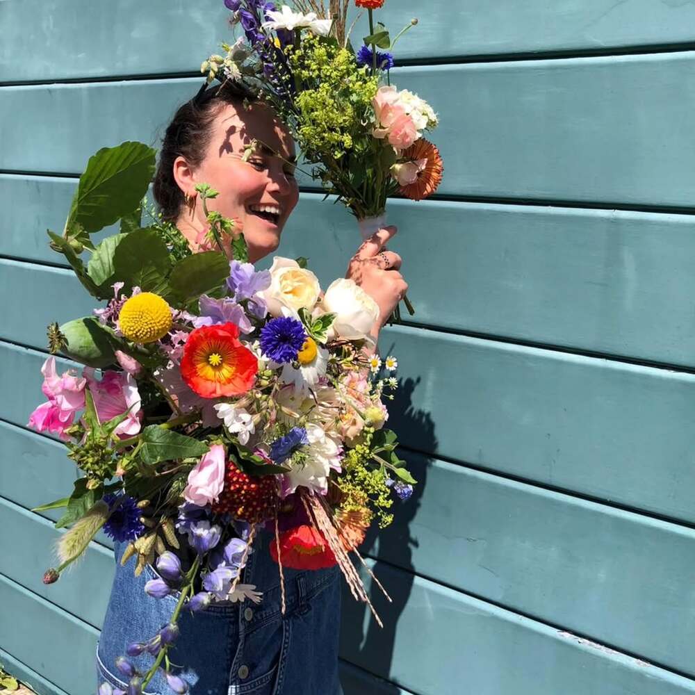 Happy Florist with Flower bouquet Happy Florist with Flower bouquet