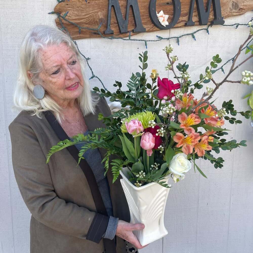 Old women with Flower Bouquet Old women with Flower Bouquet