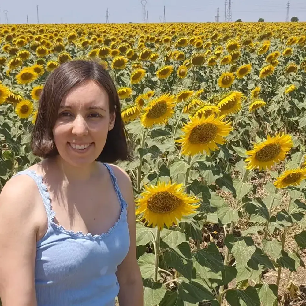 women standing for spanish sunflower garden women standing for spanish sunflower garden