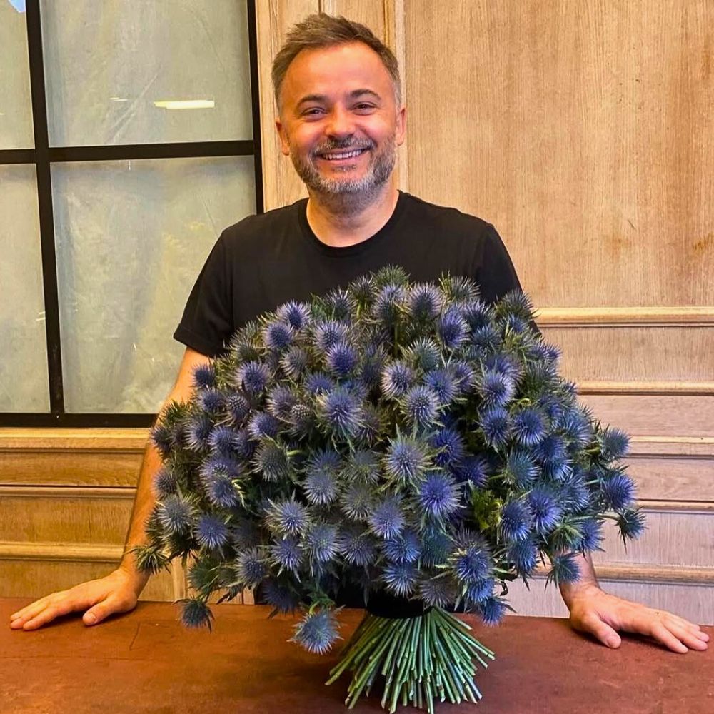 Florist Nicu Bocancea with Eryngium bouquet Florist Nicu Bocancea with Eryngium bouquet