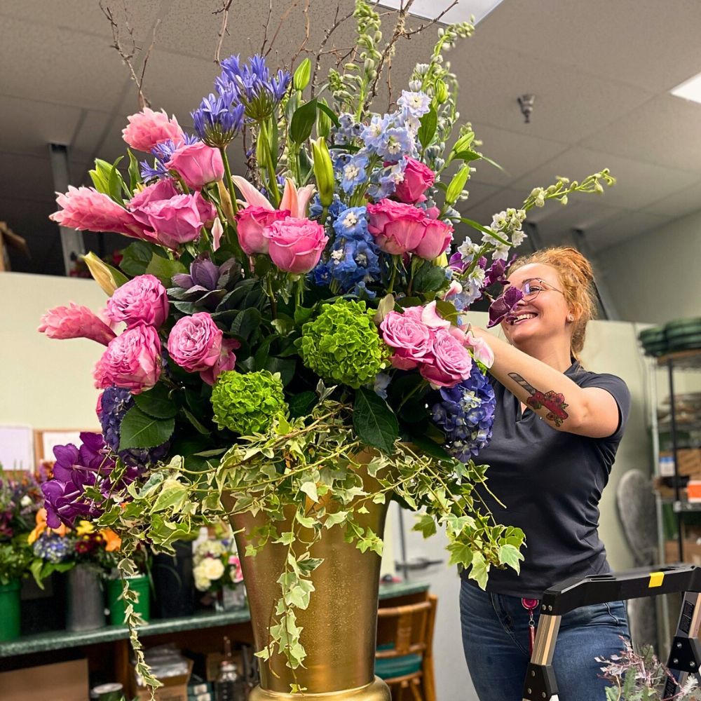 Florist and a floral design New Survey Funded by the American Floral Endowment’s (AFE) Sustainabloom Reveals Promising Trends in Sustainability Across the Floral Industry
