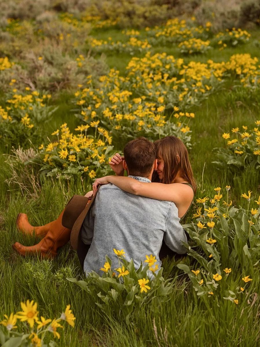 Couple on a field of flowers