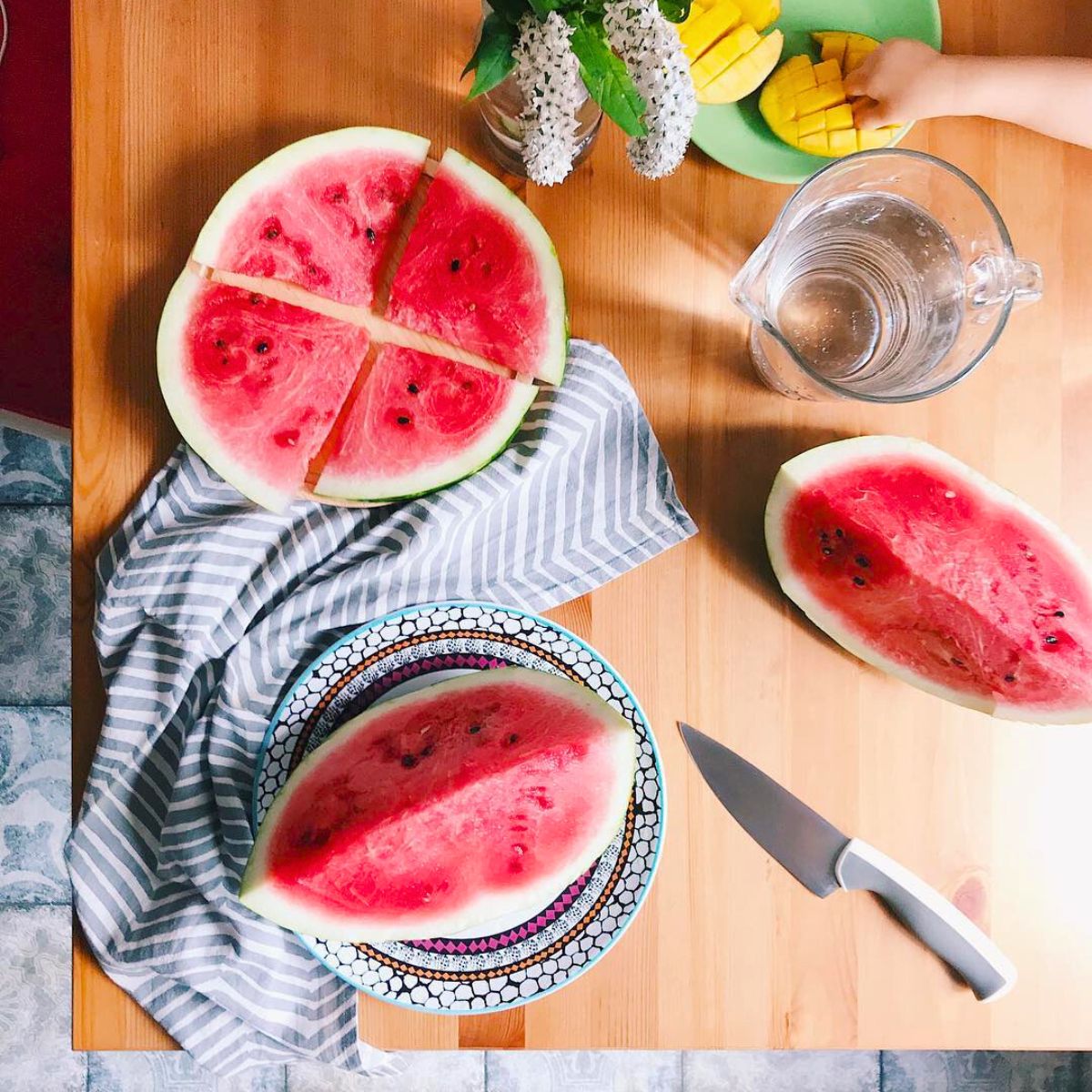 Juicy and colorful watermelons in a kitchen Juicy and colorful watermelons in a kitchen