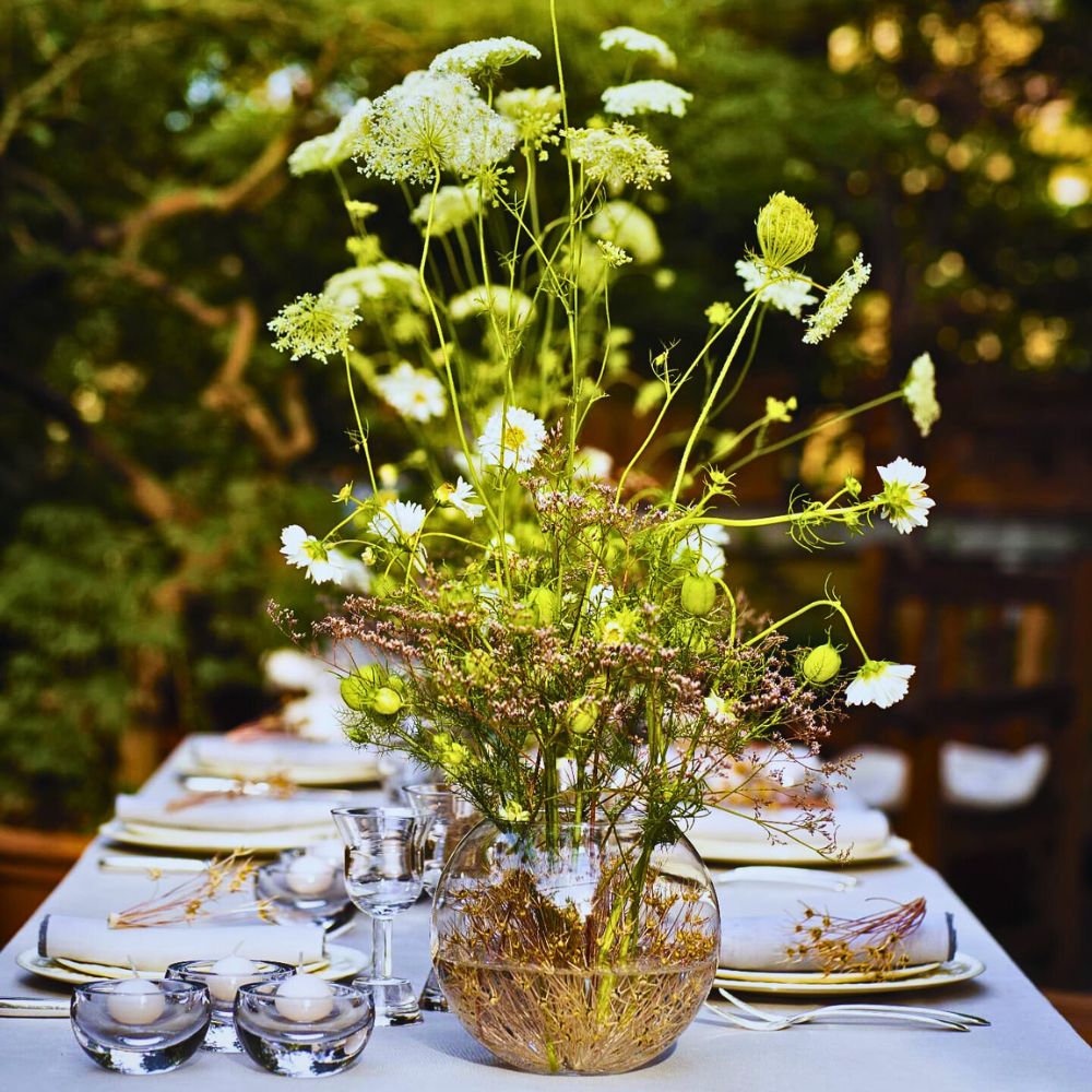 A vase of flowers Simple and Minimalist Design Ideas to Capture the Easy Essence of Summer