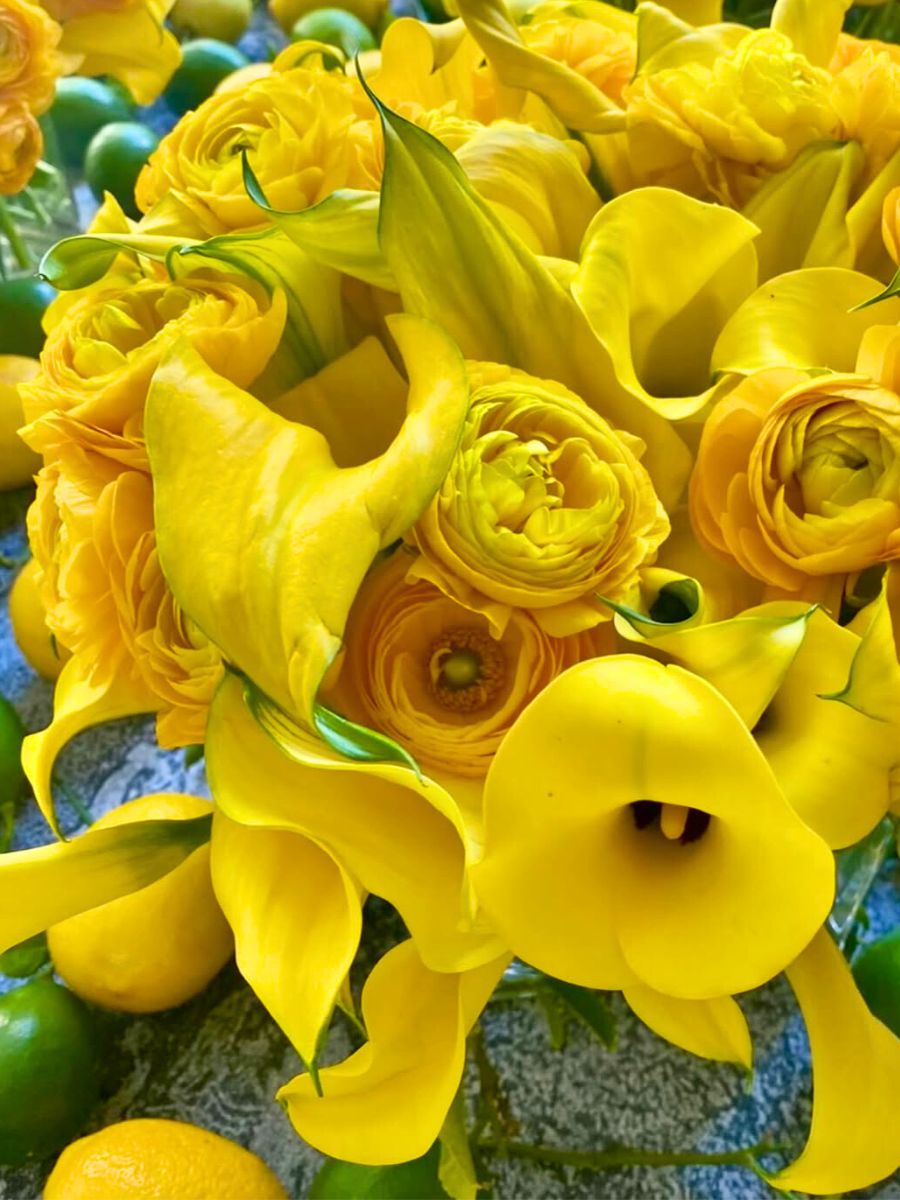 Yellow calla flowers and ranunculus