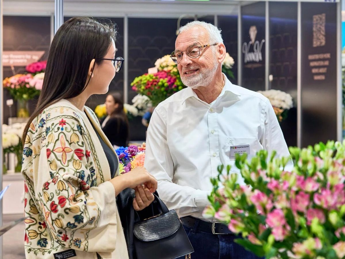 Exhibitors interacting at Flora Expo Astana Brand Marketing
