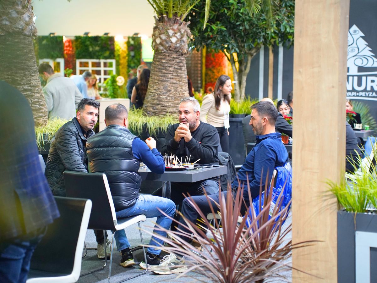 Group of four men at the Landscape Fair