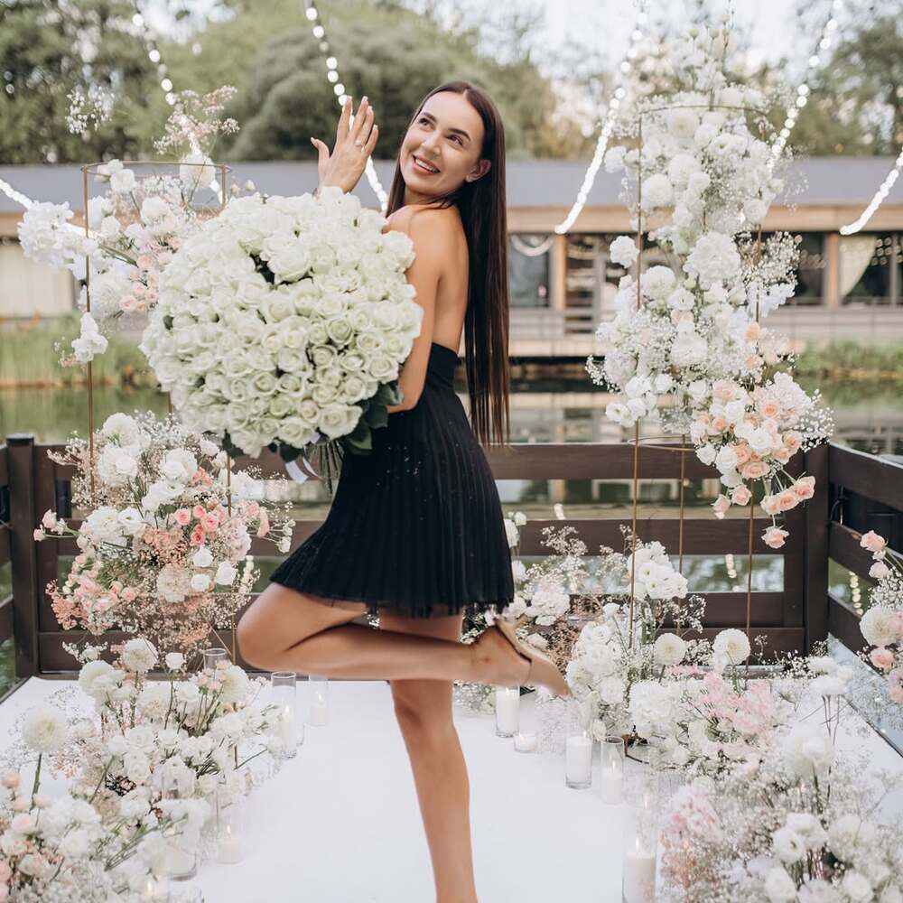 Bride-to-be holding white roses Bride-to-be holding white roses