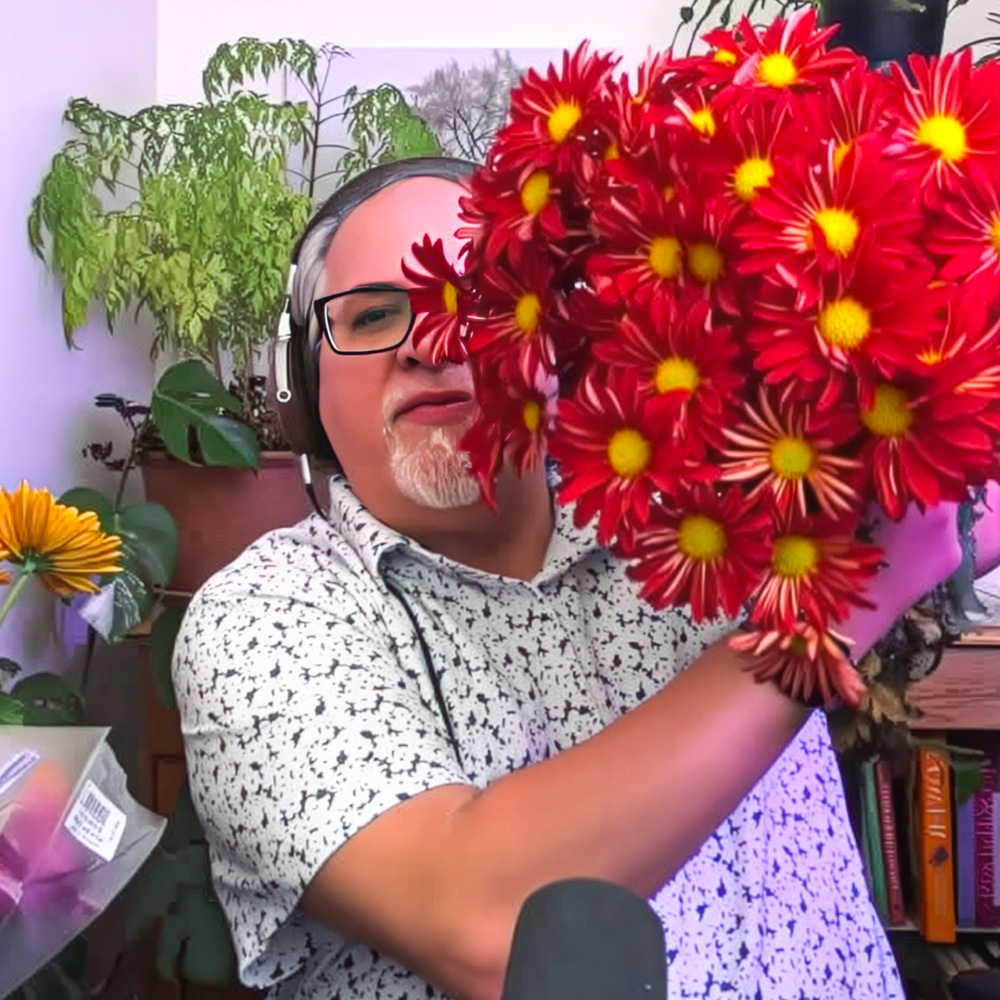 Scott Shepherd with Chrysanthemums during a podcast