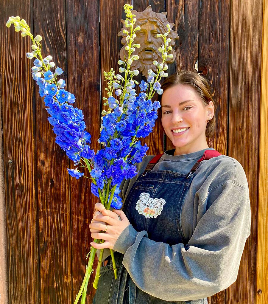 Blue Delphinium bouquet with girl from flowersonthevinedenver Blue Delphinium bouquet with girl from flowersonthevinedenver
