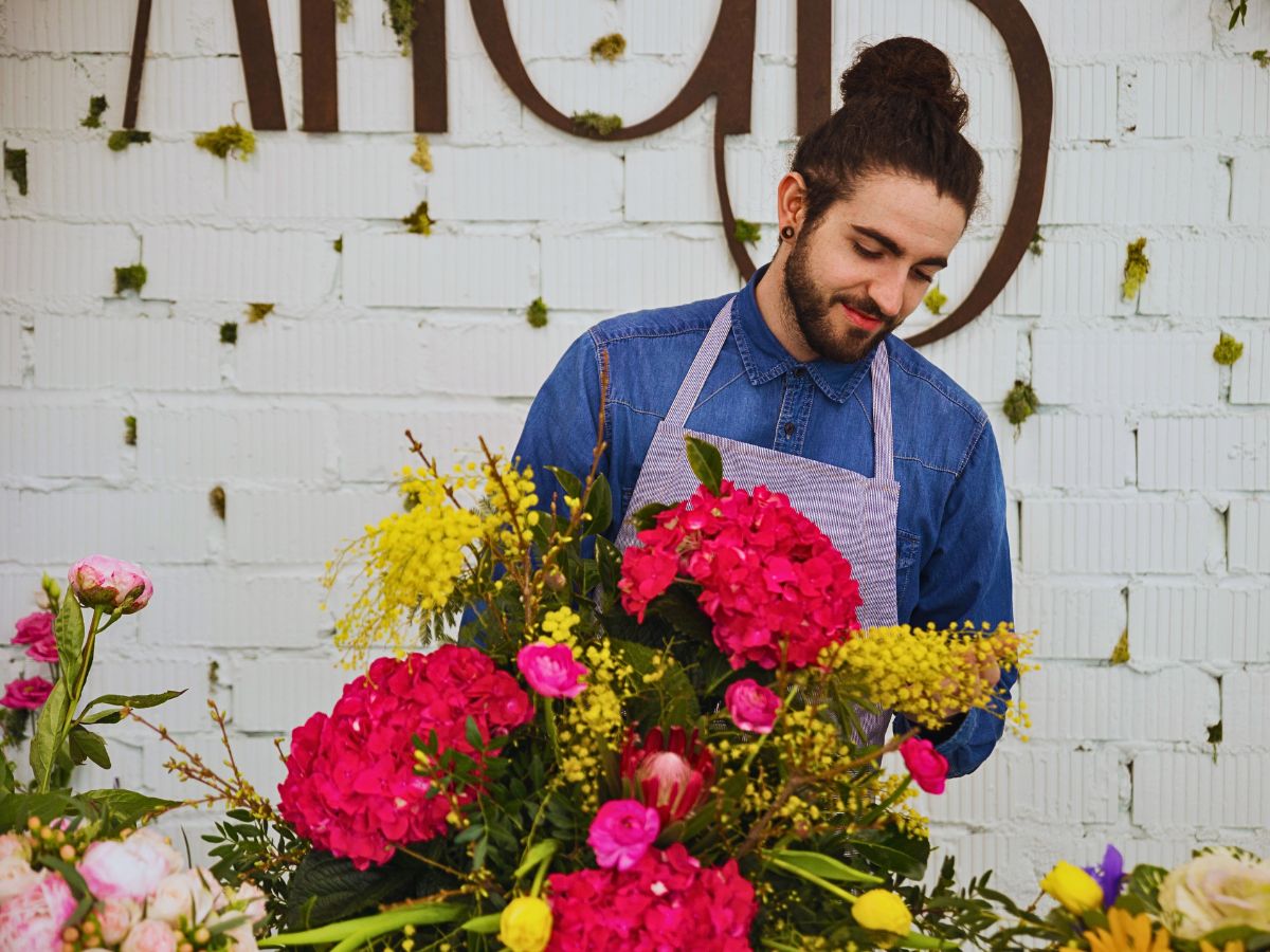 Florist with flowers Science of Flower Colors and Why Some Easily Attract More Attention Than Others
