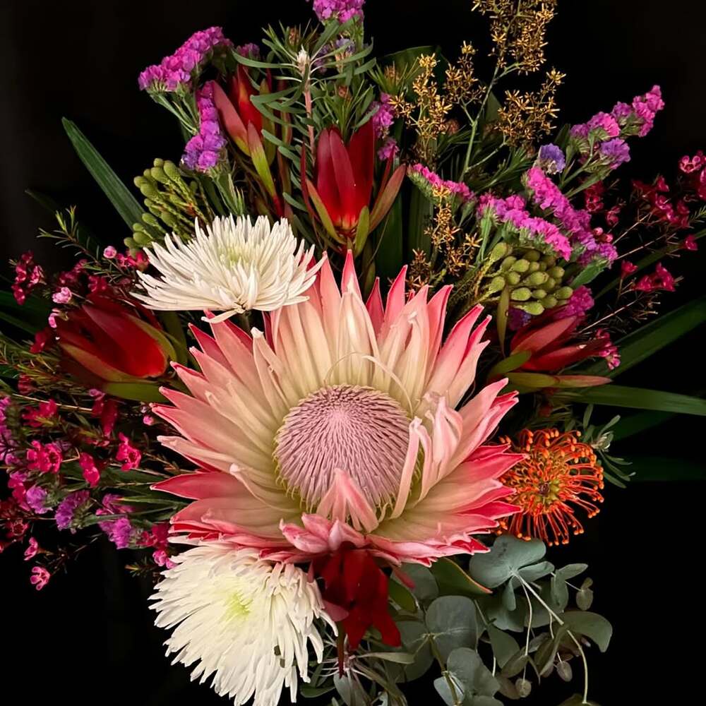 Vibrant bouquet with pink protea Vibrant bouquet with pink protea