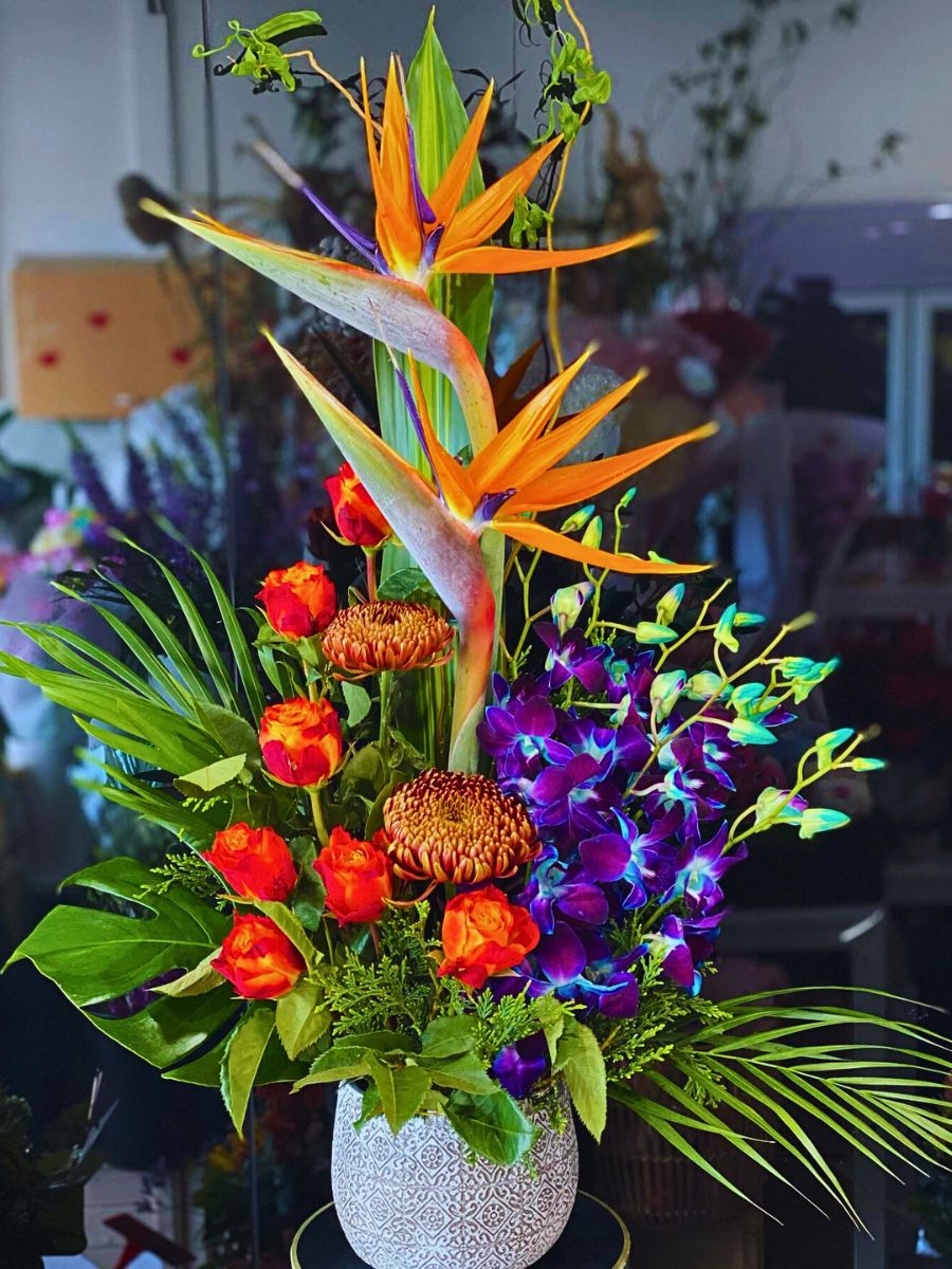 Bird of Paradise Floral Design another flower arrangement that includes Strelitzia