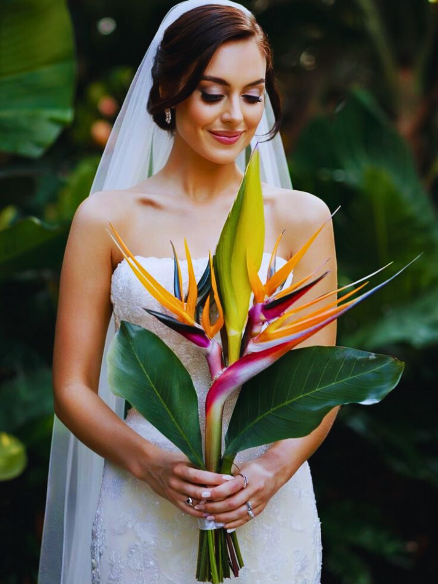 Bird of Paradise wedding bouquet Bird of paradise wedding bouquet - inset: a bride holding Bird of Paradise
