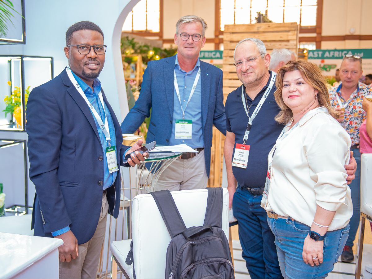 Jackson with Jackson poses for a picture with Fred van Tol and buyer Stelios and Anna at IFTEX 10 Questions to Jackson Waweru