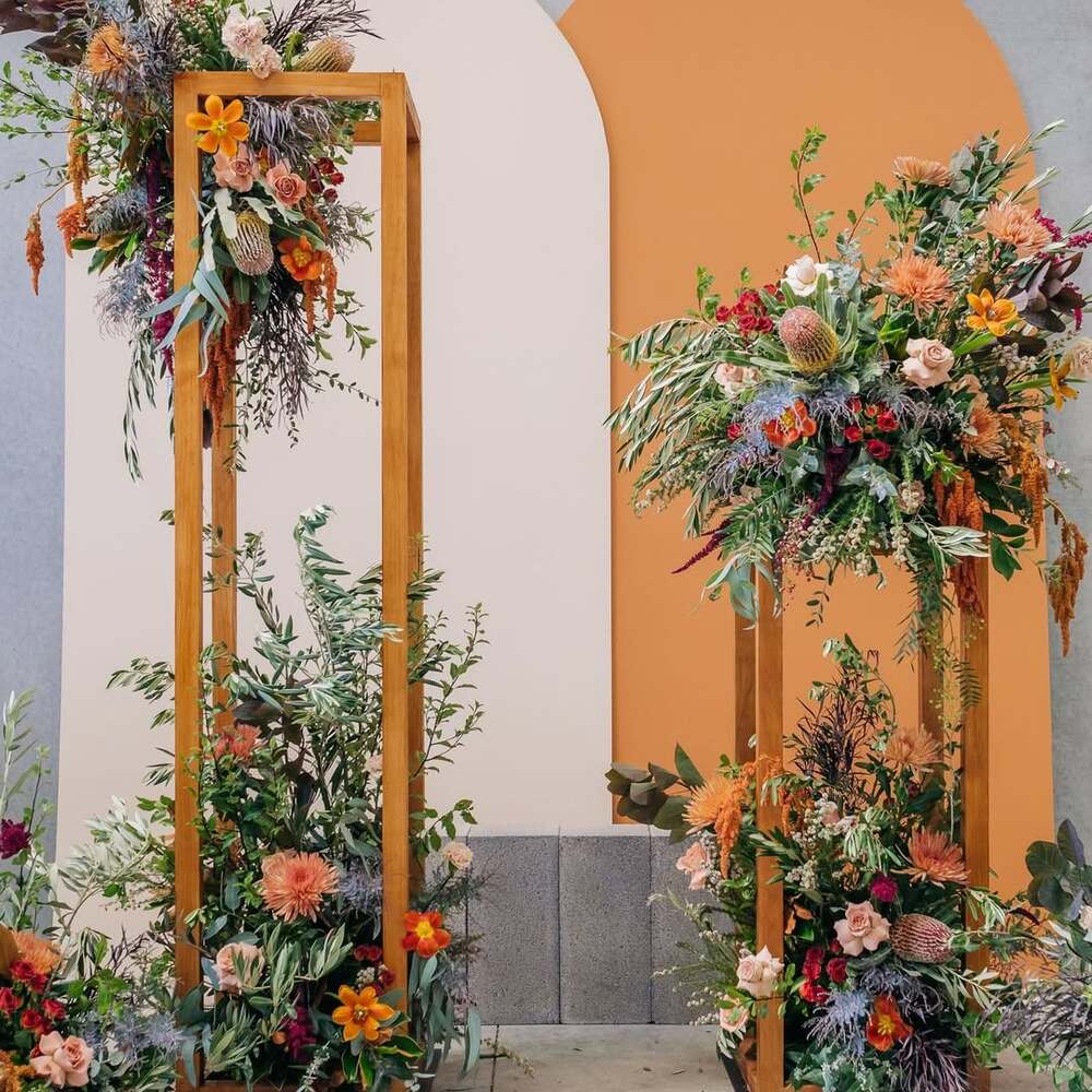 Colorful floral arrangements on wooden frames