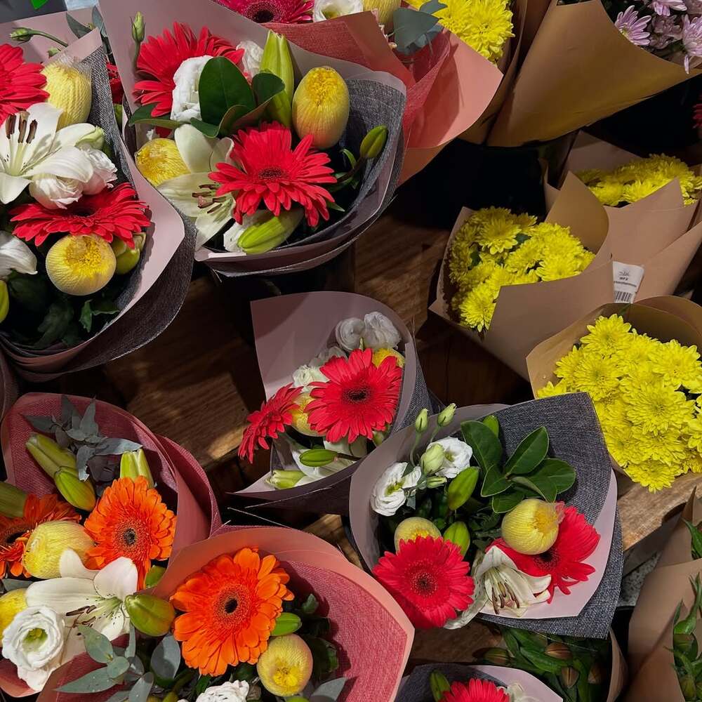 Colorful wrapped flower bouquets display